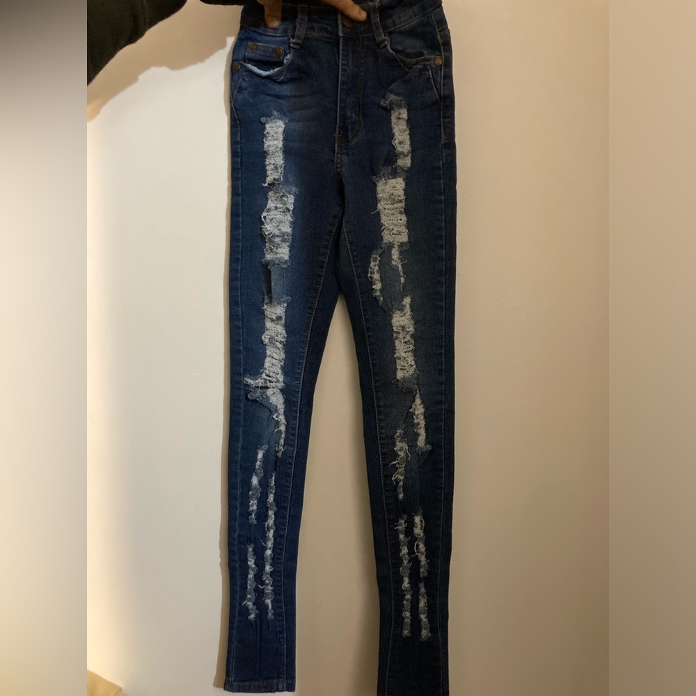 Dark wash ripped skinny jeans. High rise jeans